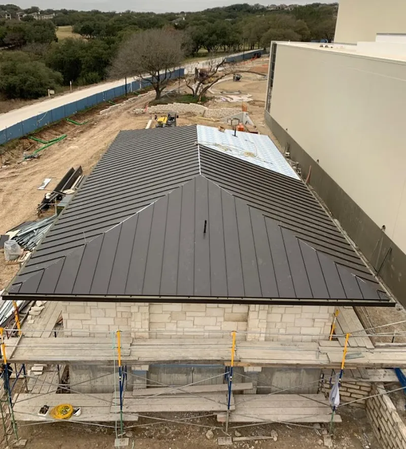 Metal roof new construction with scaffolding in Plainfield